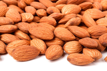peeled almonds isolated on a white background 