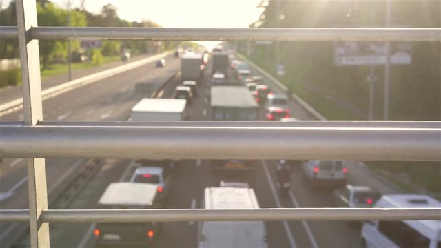 Extremely long line of cars stuck in traffic jam on highway during rush hour
