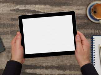 Man holding a digital tablet