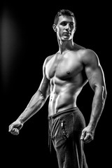 Fototapeta premium Image of very muscular man posing with naked torso