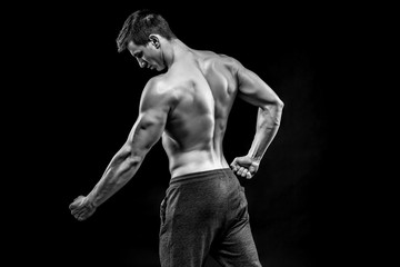Fototapeta na wymiar Image of very muscular man posing with naked torso