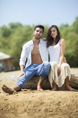 Fototapeta premium happy couple in love on beach,shallow depth of field