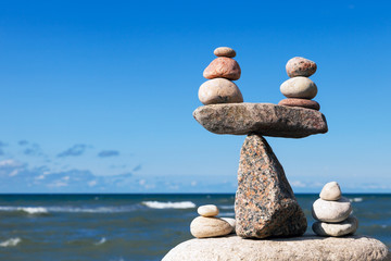 Concept of harmony and balance. Balance stones against the sea.