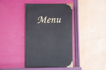 Menu Book on Pink Background