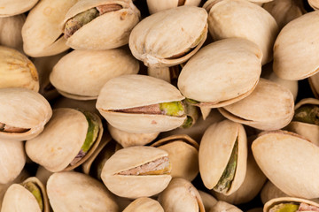 Pistachio nuts arranges as background