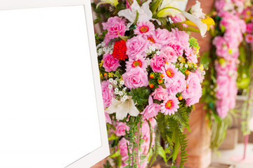 bouquet pink flowers and photo frame white