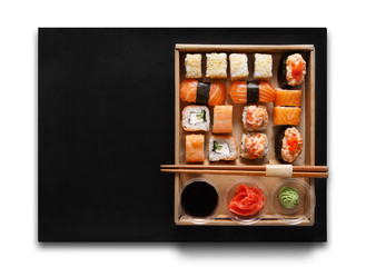 Set of sushi maki and rolls at box isolated.