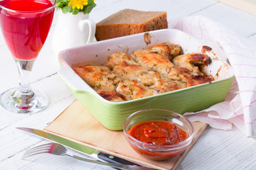 The baked chicken wings with a ruddy crust
