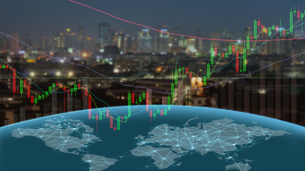 Fototapeta na wymiar business graph on screen with modern night city background