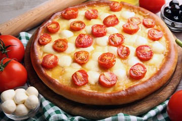 Pizza Margherita with vegetables, close-up