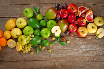 Fruits on wooden background