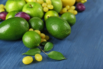 Fruits on dark blue wooden background