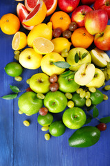 Fruits on dark blue wooden background