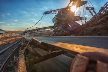 Long conveyor belt transporting ore