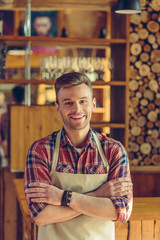 Handsome barista at cafe