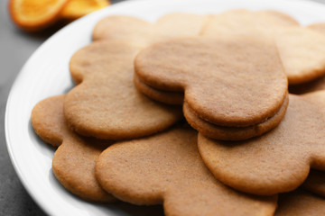 Heart shaped biscuits on plate, closeup