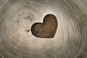 Wood carving, symbol of love, the heart. Background for your des