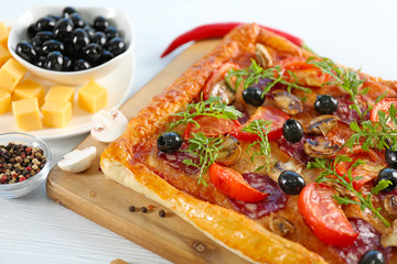 Rectangle delicious pizza on the table, close-up