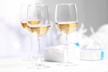 Wineglasses on light blurred background