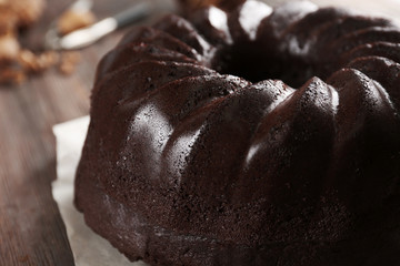 Chocolate muffin cake, on the table, close-up