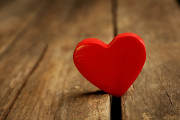 Fototapeta premium Wooden heart on rustic wooden background