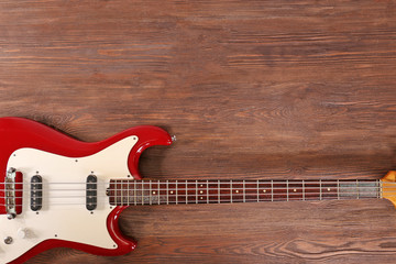 Obraz na płótnie Canvas Electric guitar on wooden background