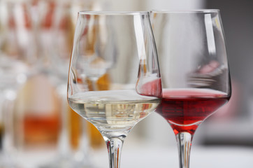 Wine glasses with red and white wine, closeup