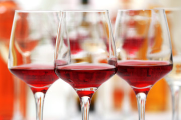Wine glasses with red and white wine, closeup