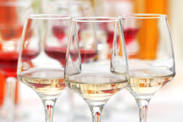 Wine glasses with red and white wine, closeup