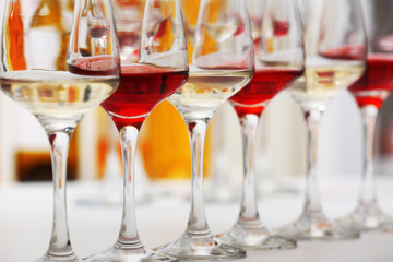 Wine glasses with red and white wine, closeup