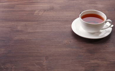 Cup of tea on wooden table