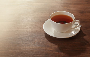 Cup of tea on wooden table