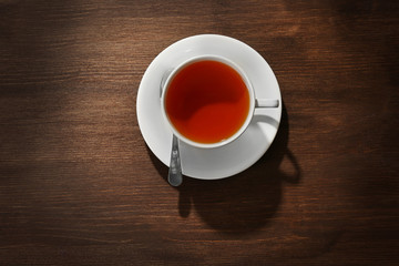 Cup of tea on wooden table