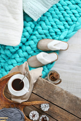 Cup of hot drink in living room. Comfortable winter weekend or holidays at home