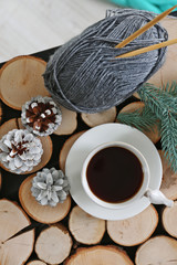 Beautiful winter composition with cup of hot drink
