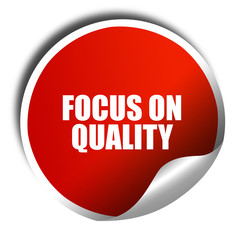 focus on quality, 3D rendering, red sticker with white text