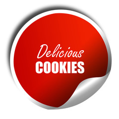 Delicious cookies sign, 3D rendering, red sticker with white tex