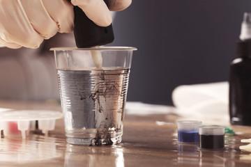 Preparation process for making soft shadows on tattoo, close up