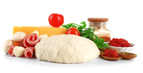 Fresh dough and other different ingredients for pizza isolated on white