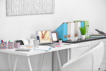 Stylish bright workplace in office