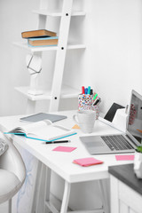 Stylish bright workplace in office