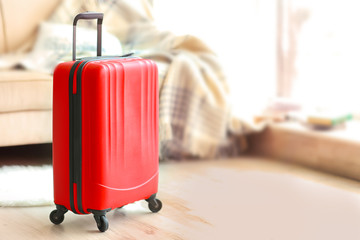 Large red polycarbonate suitcase, close up