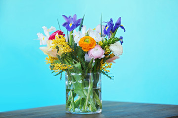 A bouquet of fresh flowers in a glass vase.