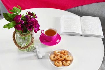 Tea time composition on white table