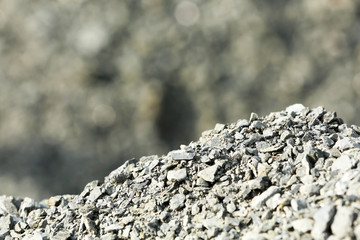 Pile of crushed grey stones.