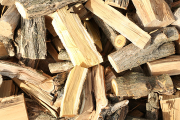 Firewood background - chopped firewood
