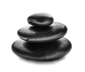 Stack of spa hot stones isolated on white