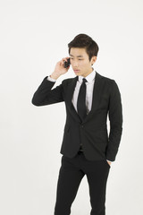 Asian businessman using mobile smart phone