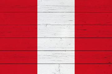 Flag of Peru on wooden background