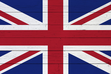 Fototapeta premium Flag of the United Kingdom on wooden background